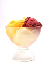 yellow and red color ice cream over white