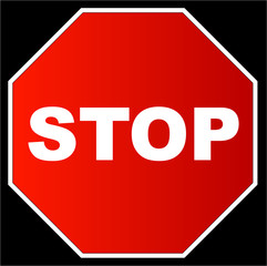 red stop sign against a black background 