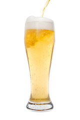 Pouring beer in a pilsner glass