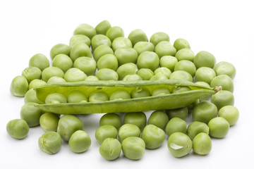 fresh green peas on a white background