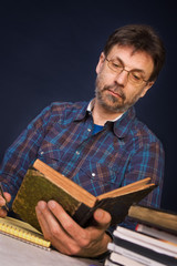 Professor with old books