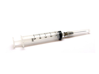 Medical syringe with needle on white blackground