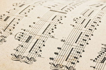 Antique music score,close up studio shot.