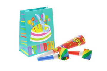Colorful gift bag and party blowers