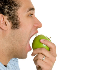 Man Eating Green Apple