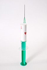 syrringe with ace of hearts