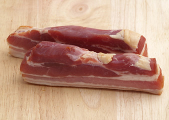 smoked bacon on wooden board