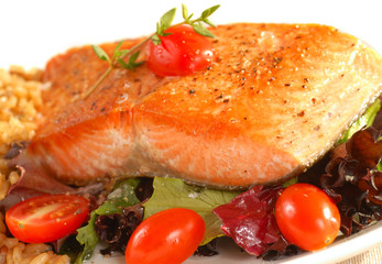 Sauted salmon on brown rice and greens