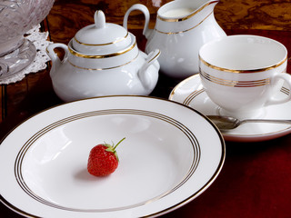 Single strawberry on a placement set up