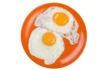 Omelet on the red plate isolated on white