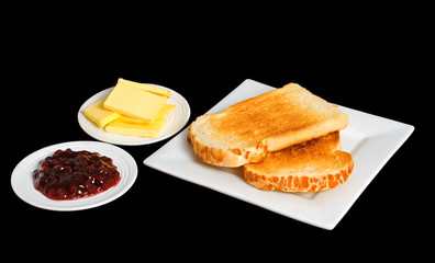 Toast and Jam on black background