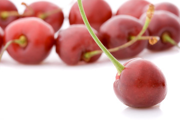 sweet cherries with one cherry at front side