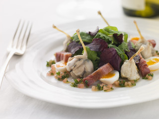 Salad of Frog Legs Lardons and Quail Eggs