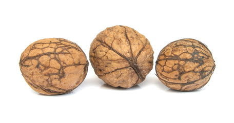 Three walnuts isolated on white