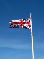The Union Flag of Great Britain blowing in the wind.
