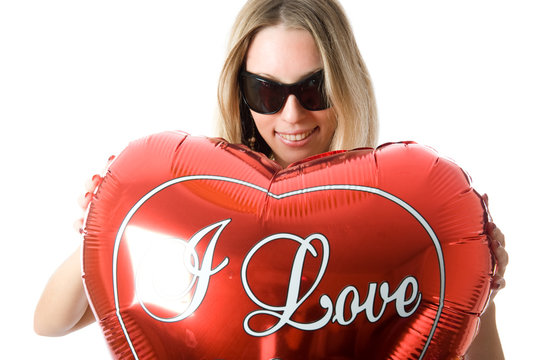 Beautiful Fashion Woman  With A Red Party Balloon.