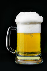 Mug of beer with froth