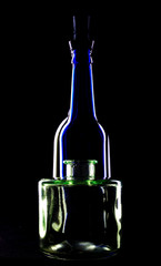 Bottles of wine on black