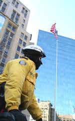 riot police in yellow power with amnesiac flag in the city