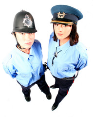 overhead view beautiful brunette and blonde police woman