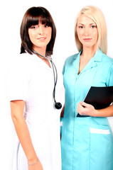 Beautiful brunette female doctor and nurse