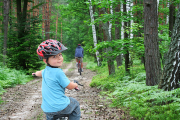 Bike trip through the forest - 8325522