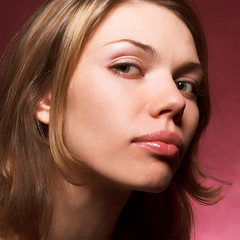 Fototapeta premium Closeup portrait of a young beautiful woman