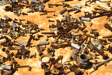 Old rusty screws and parts.
