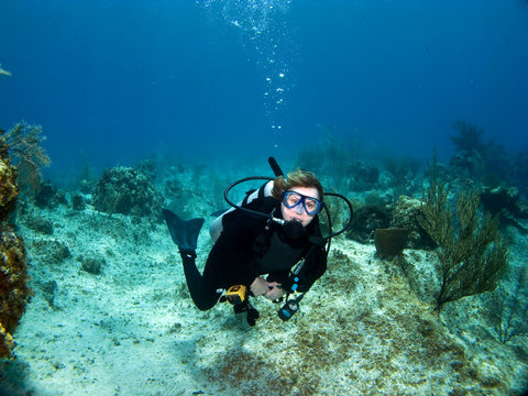 Female Scuba Diver looking at the Camera