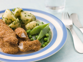 Chicken Goujons with Herb Buttered New Potatoes and Greens