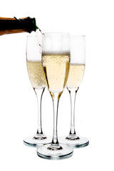 Champagne poured in to the glass (isolated on white background)