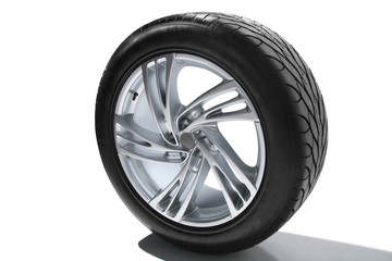 Obraz premium Wheel with steel rim over the white background