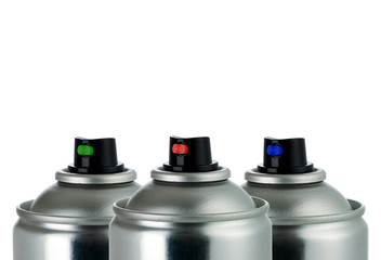 detail of three aerosol cans