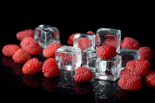 Ice cubes with raspberries