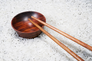 chopstick and bowl on rice