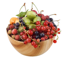 Mixed berries in wooden bowl.