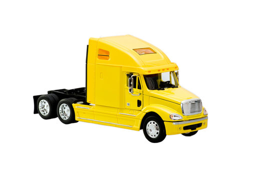 yellow toy truck isolated over white background