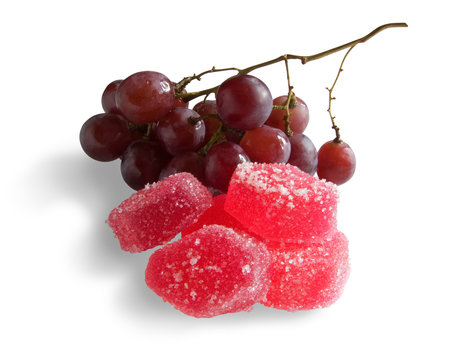Vine and lobules of fruit jellies. Isolated on white