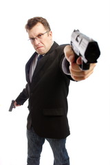 angry criminal businessman with aimed gun on white background