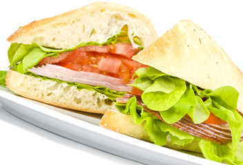 Focaccia  Sandwich with Ham on a White Plate