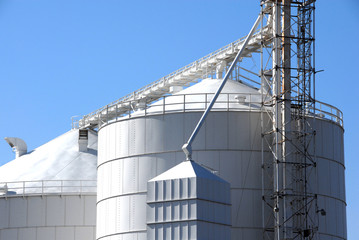 Blue Sky, White Grain Bins