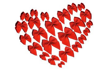 Fototapeta na wymiar Red decorative bows in heart shape symbol