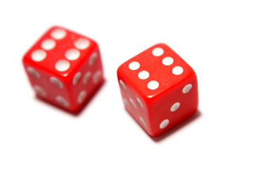 Two red dice isolated over white