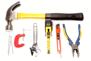 Assortment of tools over white