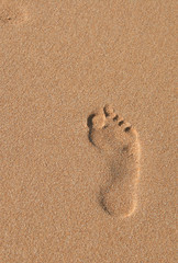 empreinte de pied dans le sable