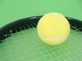 tennis ball and racket