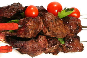 grilled meat on skewer with tomatoes