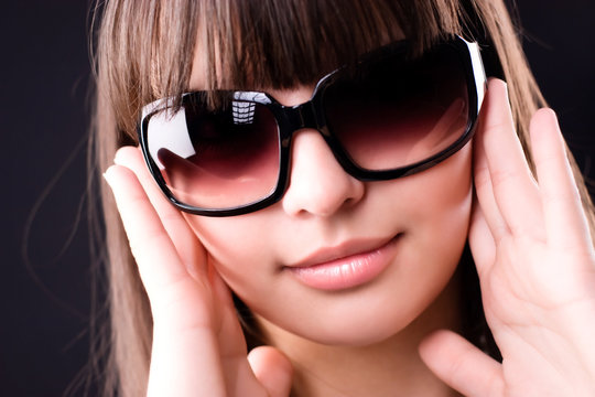 Young woman in sunglasses portrait