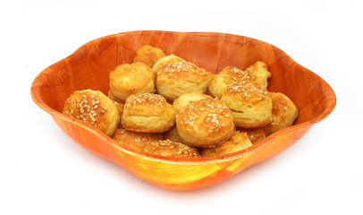 Baked ware biscuits with cheese, butter and sesame