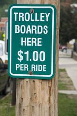 Trolley Boards Here Sign